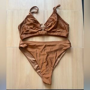 Only worn a few times AMBR designs Bronze hook crop and super highs bottoms 2XL